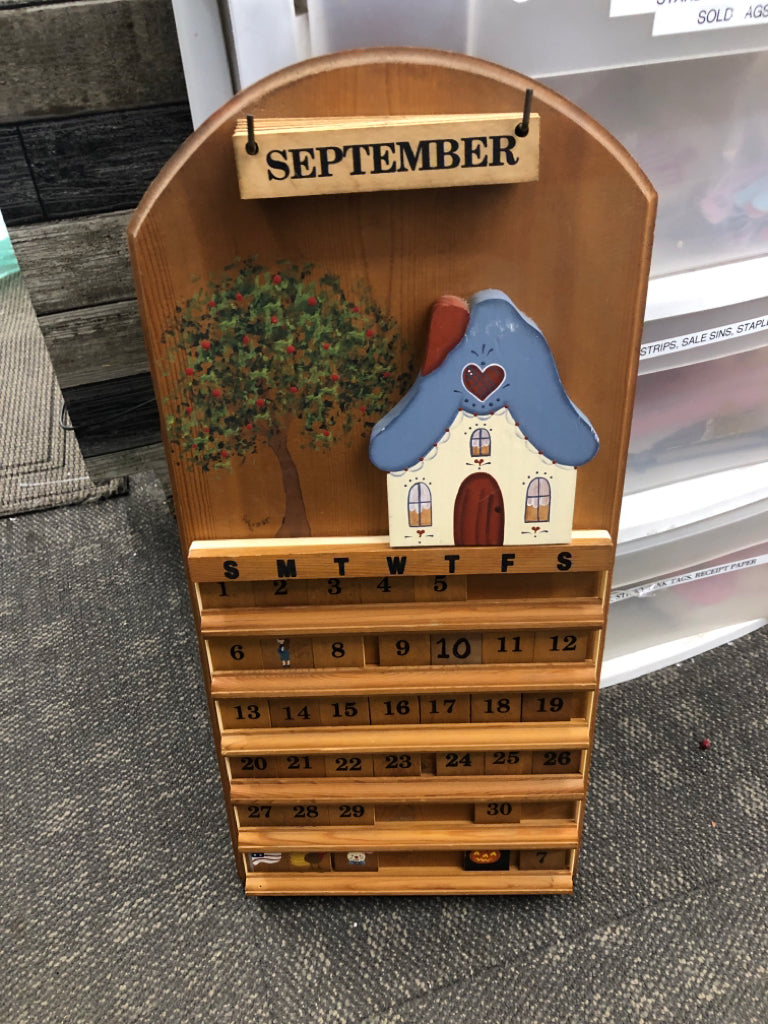 WOOD PRIMITIVE PERPETUAL CALENDAR.