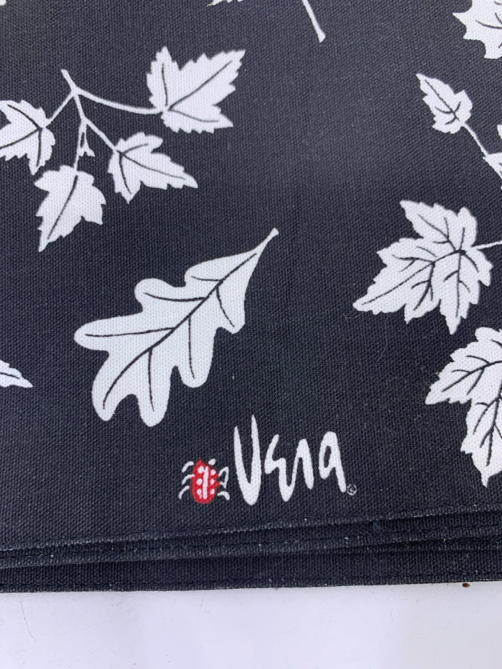 4 BLACK W/ WHITE LEAVES PLACEMATS.