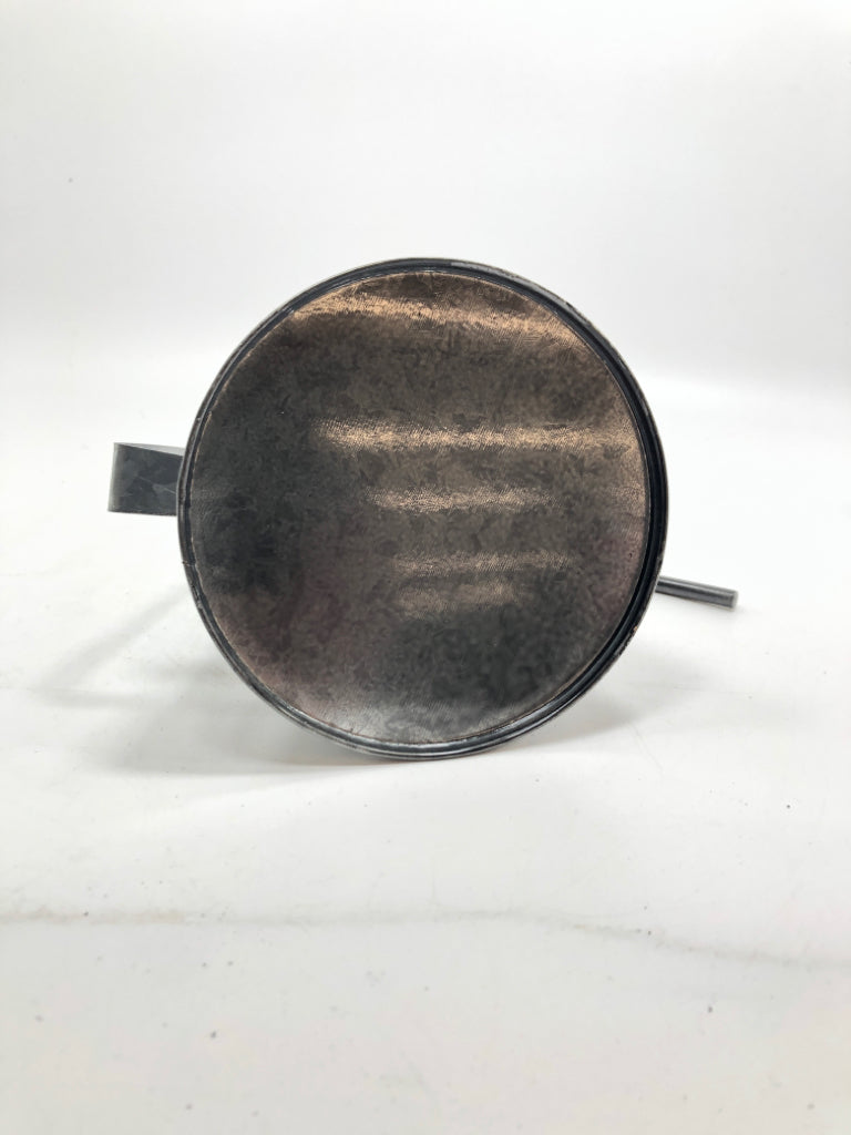 METAL OIL CAN CANDLE STICK HOLDER.
