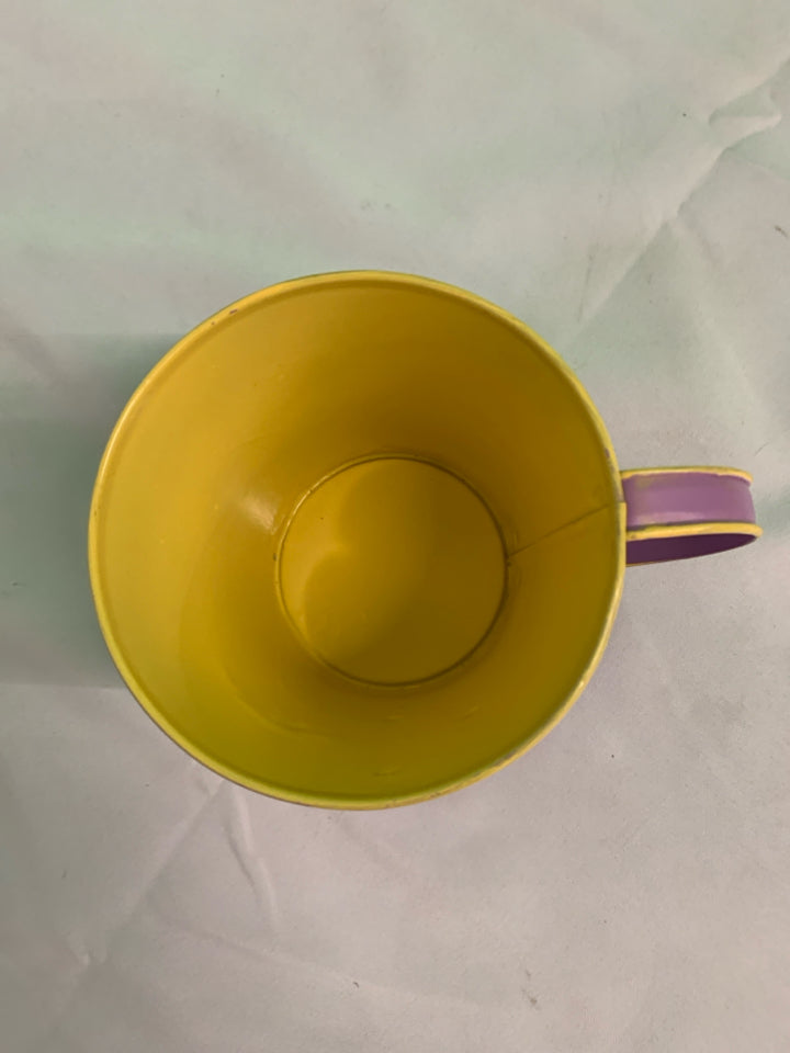 PURPLE AND YELLOW FLORAL PLANTER.