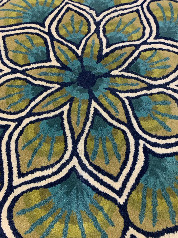 BLUE AND GREEN LOTUS FLOWER SHAPED RUG.