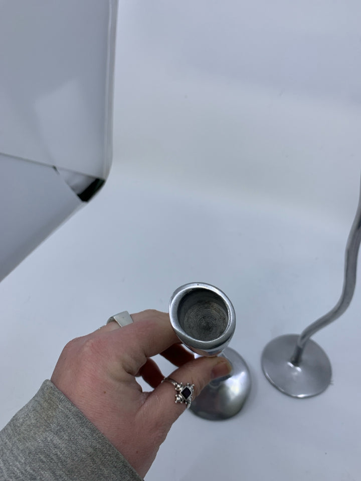 2 METAL SQUIGGLE STEM TAPERED CANDEL HOLDERS.