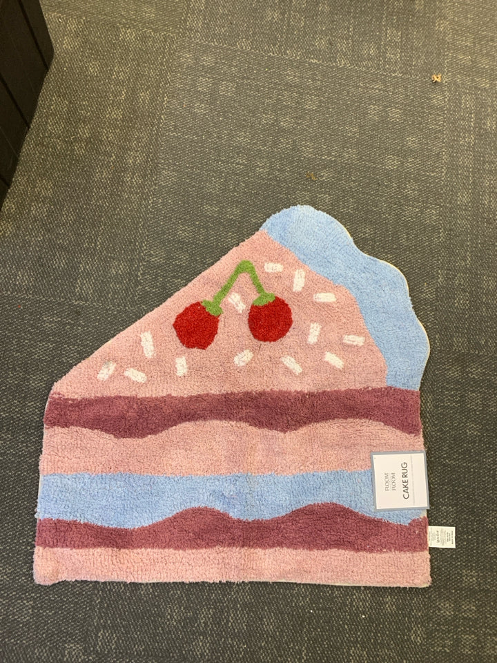 NWT CAKE RUG.