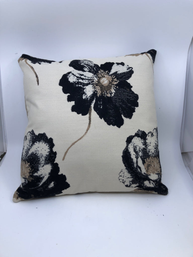 CREAM AND BLACK FLORAL SQUARE PILLOW.