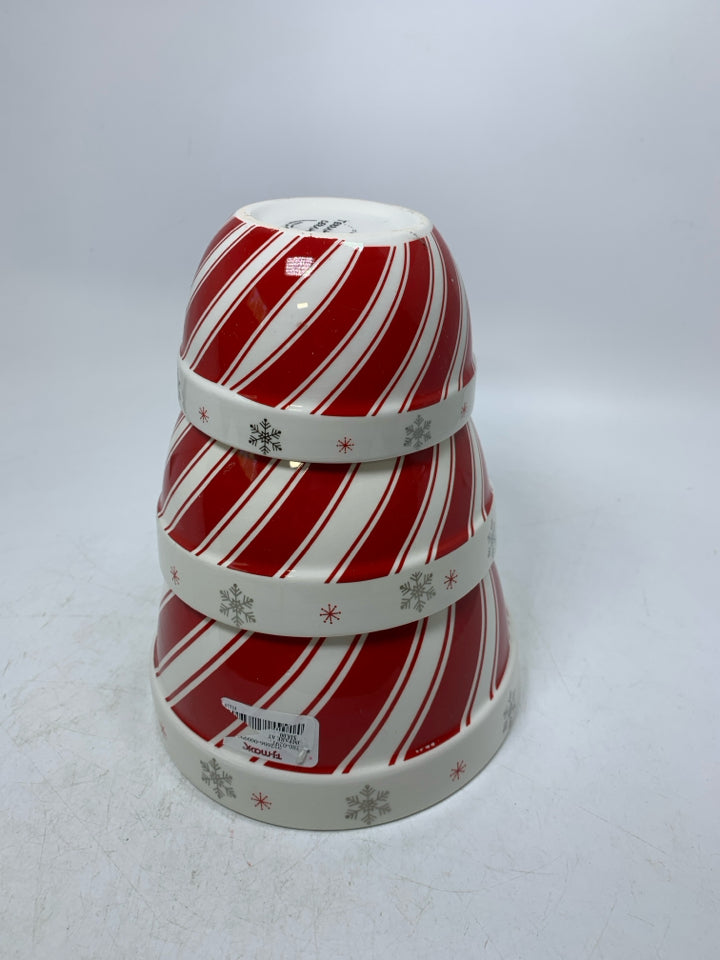 3 NESTING RED WHITE STRIPED BOWLS W/ SNOWFLAKES.