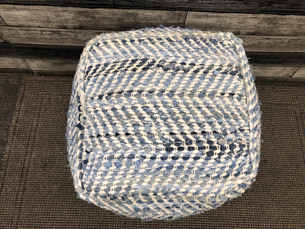 BLUE AND WHITE OTTOMAN.