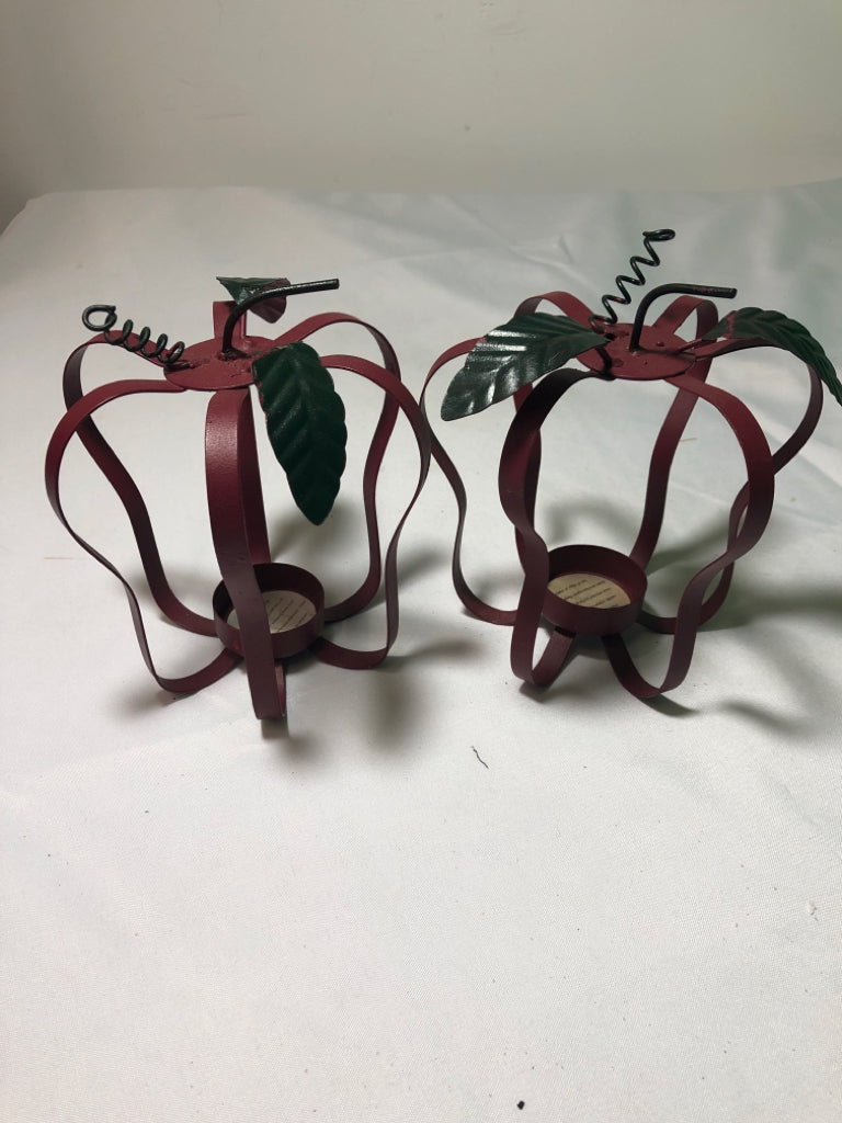 2 RED METAL APPLE SHAPED TEA LIGHT HOLDERS.