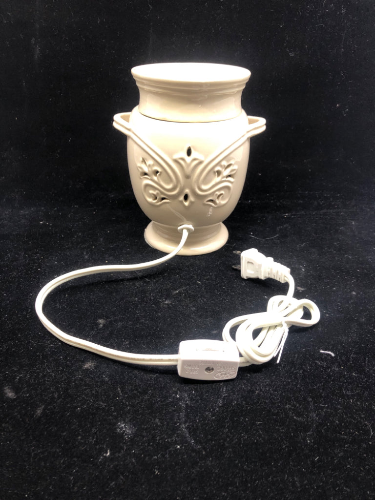 CREAM EMBOSSED WAX WARMER.