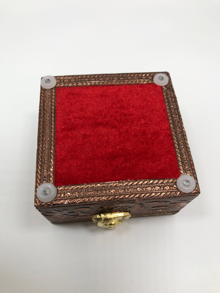 GOLD ELEPHANT BOX W/RED FABRIC LINING.