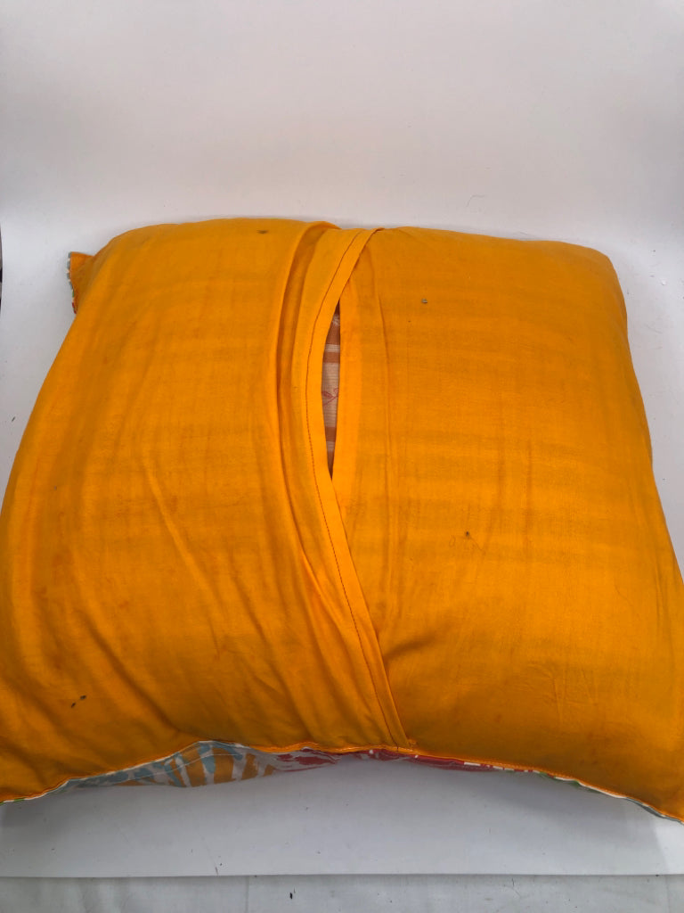 COLORFUL FLOWER W/ SOLID ORANGE BACK PILLOWS.