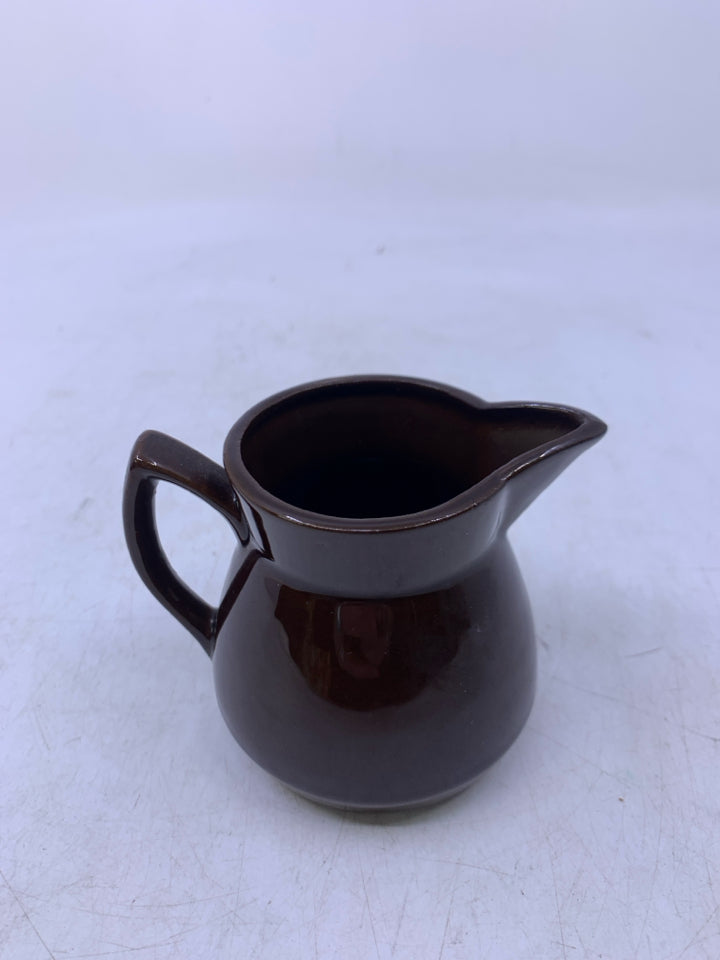 BROWN CERAMIC SMALL PITCHER.