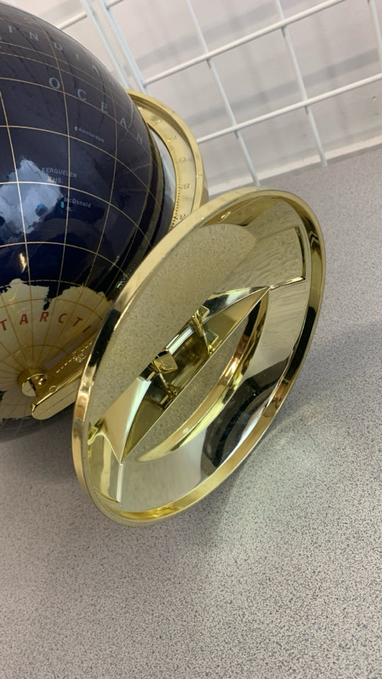 NAVY BLUE WORLD GLOBE W/GOLD PLASTIC BASE.