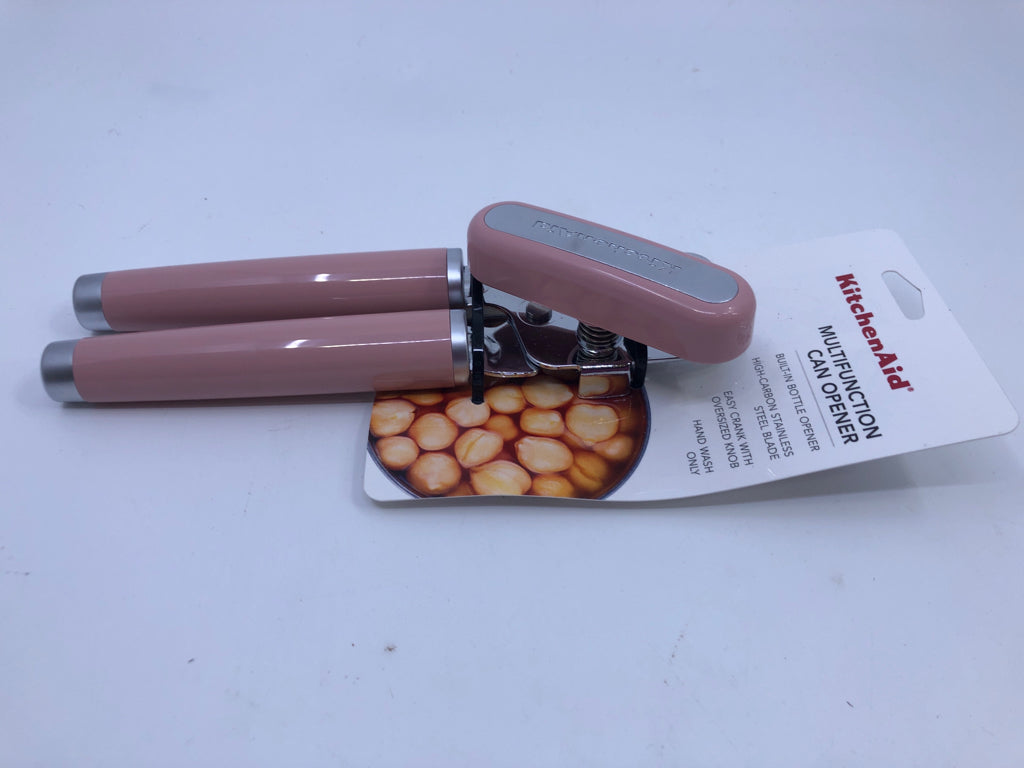 NIP PINK CAN OPENER.
