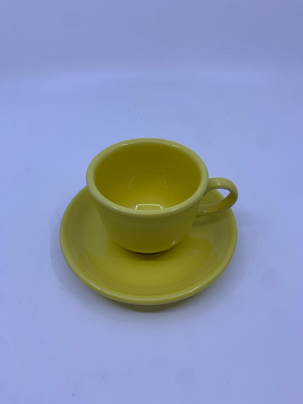 YELLOW FIESTA WARE CUP AND SAUCER.