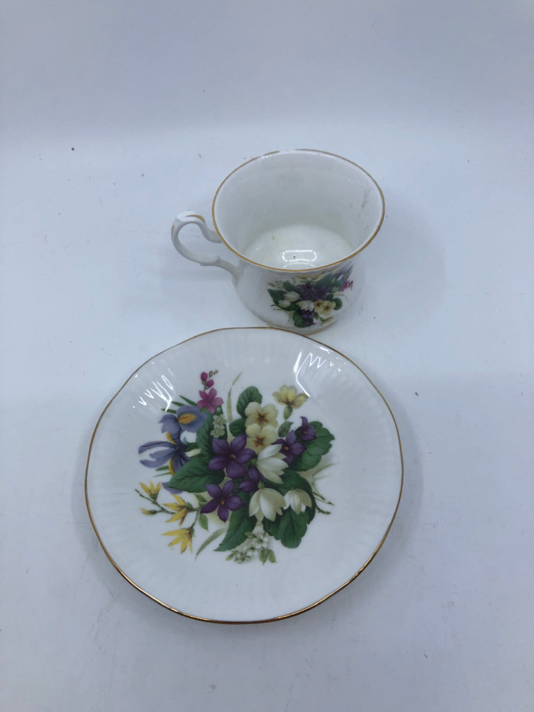 ROYAL VICTORIAN PURPLE AND WHITE FLORAL TEACUP AND SAUCER.