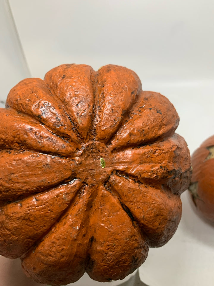 2 RESIN STAR CUTOUT PRIMITIVE STYLE PUMPKINS.