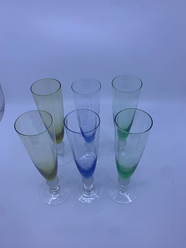 6 MULTI-COLORED FOOTED FROSTED BALL CHAMPAGNE FLUTES.