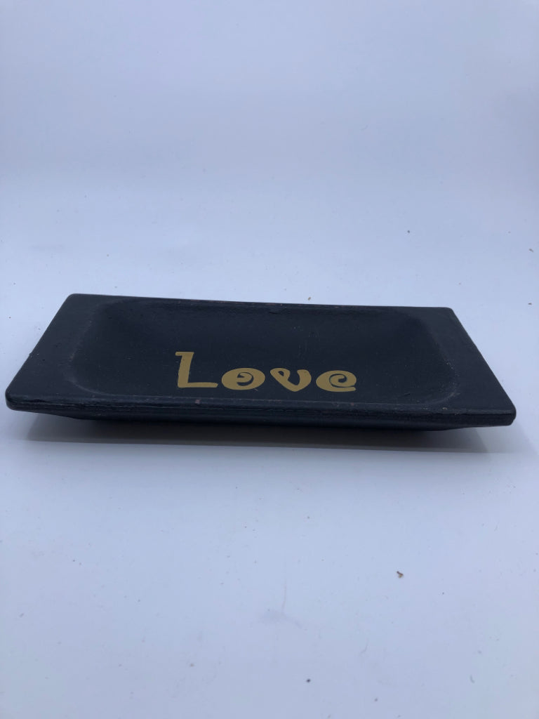 BLACK PRIMITIVE LOVE PLATE.