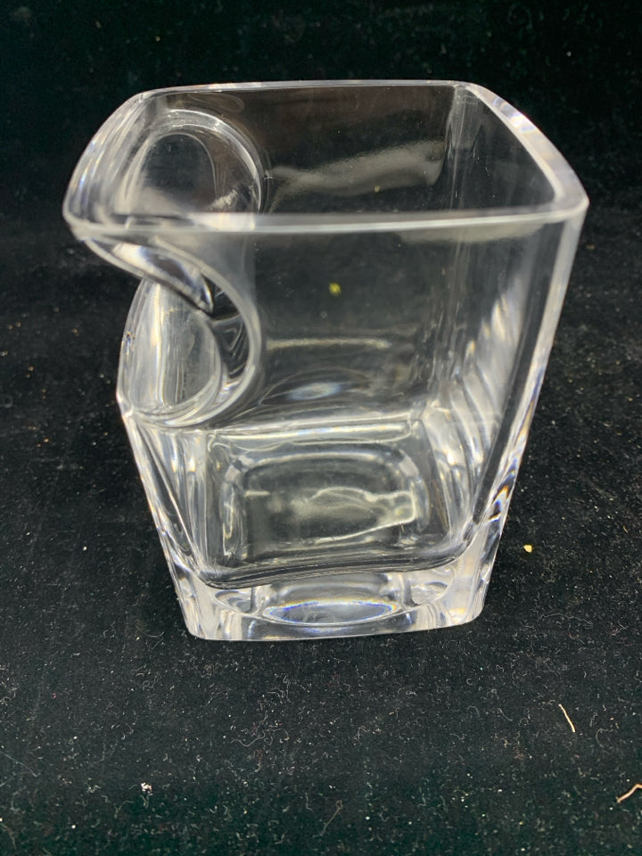 SMALL GLASS JAR.