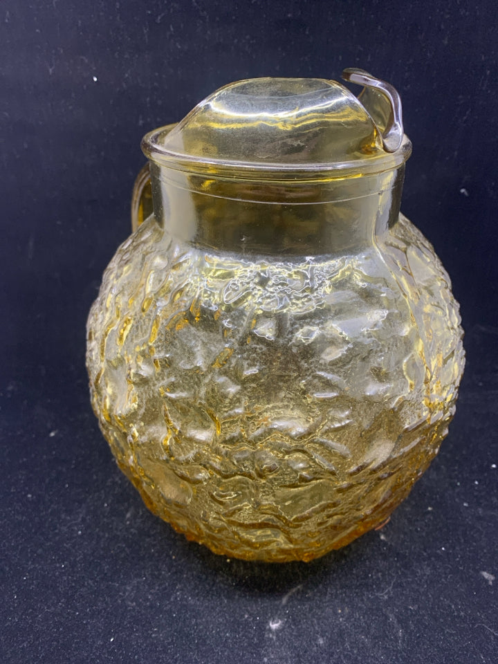 VTG AMBER GLASS TEXTURED PITCHER ICE LIP.