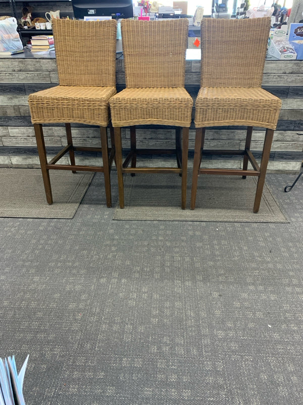 3 BROWN WICKER BAR STOOLS.