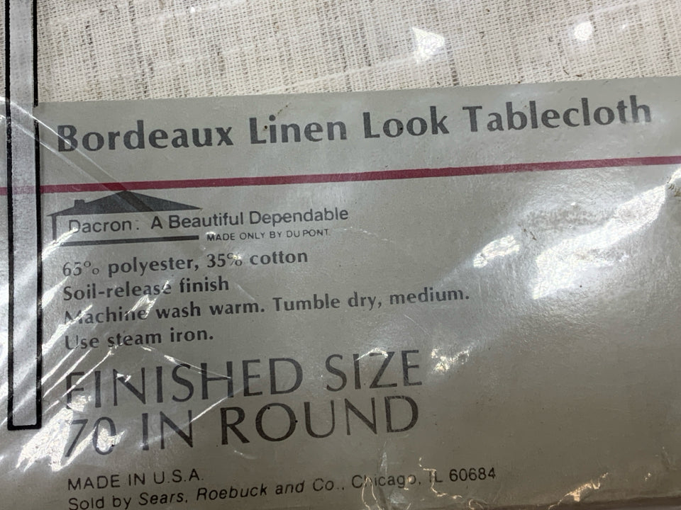 NIP ROUND BORDEAUX LOOK LINEN TABLECLOTH.