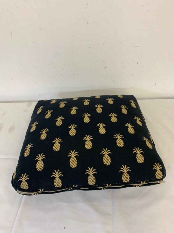 SQUARE BLACK PILLOW W/ PINEAPPLES.