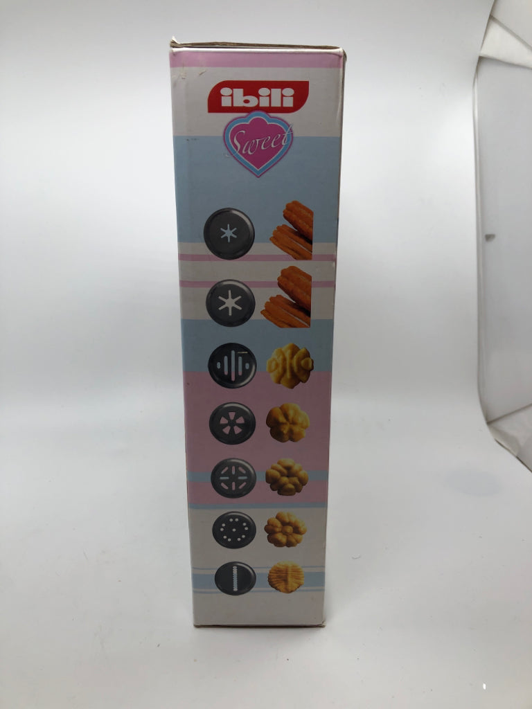 NIB COOKIE MAKER W/ATTACHMENTS.
