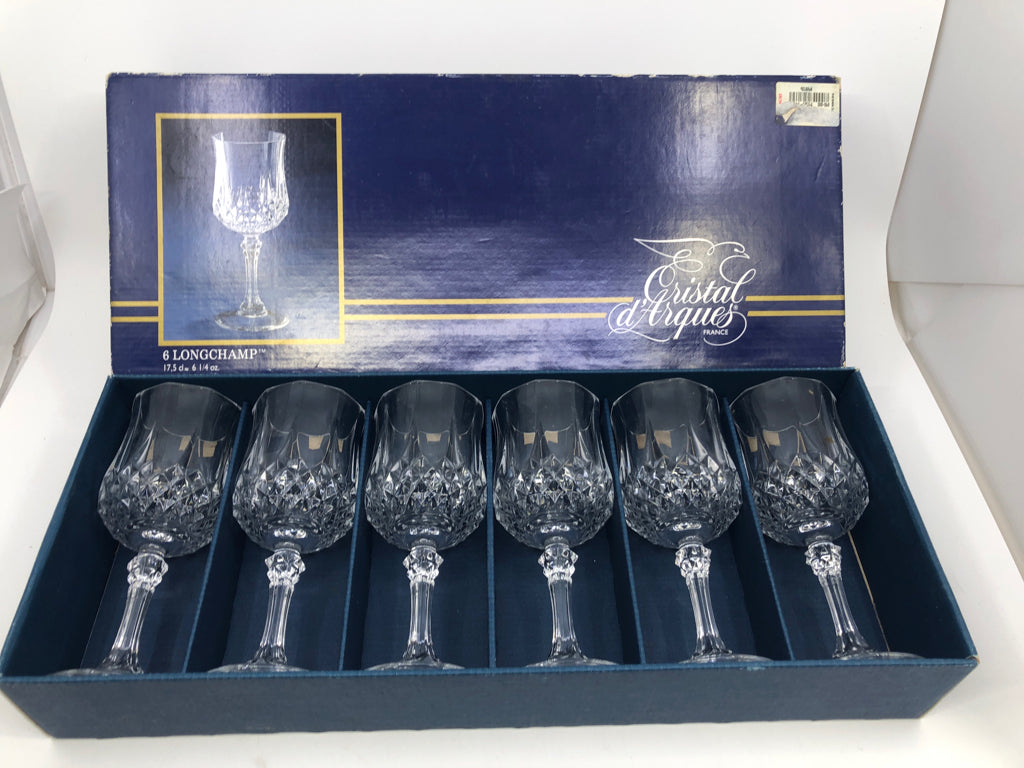 6 LONGCHAMP WINE GLASSES IN BOX.