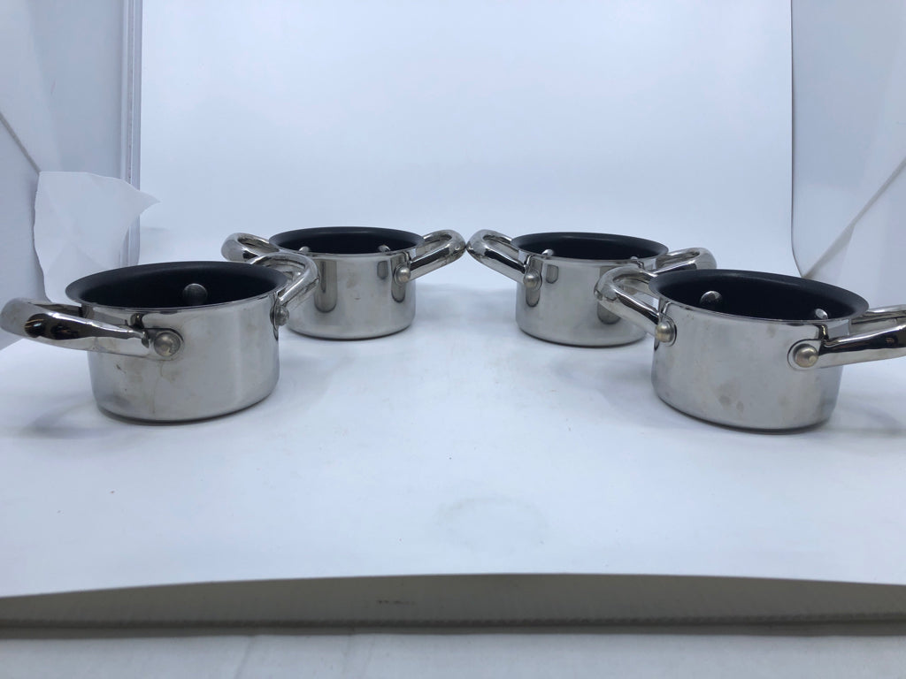 4 MINI STAINLESS STEEL POTS.