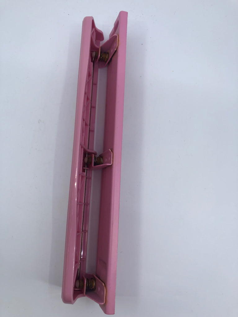 PINK HOLE PUNCH.