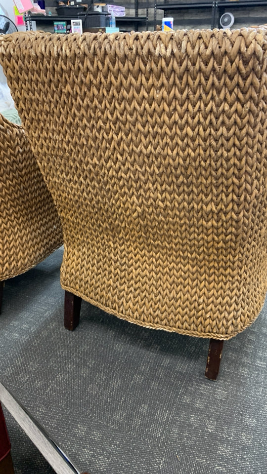 WICKER CHAIR W/BROWN CUSHION.