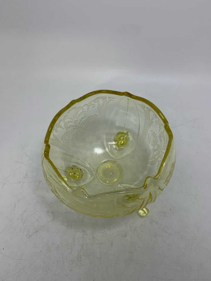 VTG FOOTED YELLOW PRESSED DETAILS BOWL W/ UNEVEN EDGE.