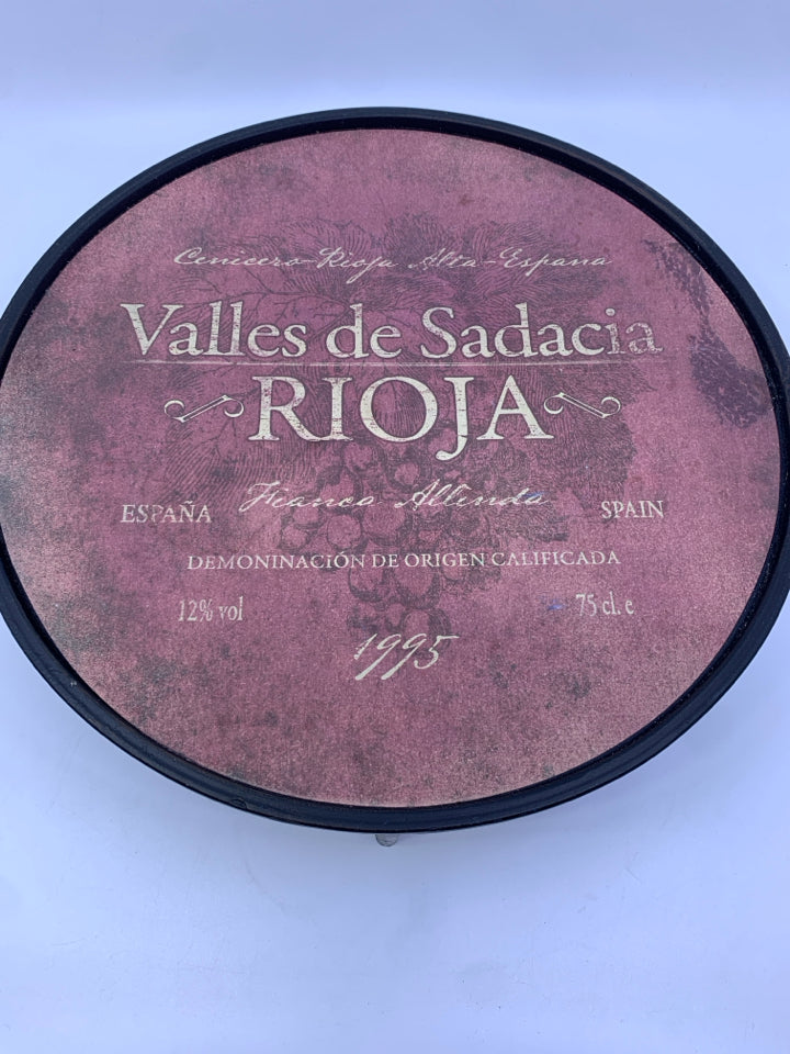 DECORATIVE BLACK METAL WINE TRAY.