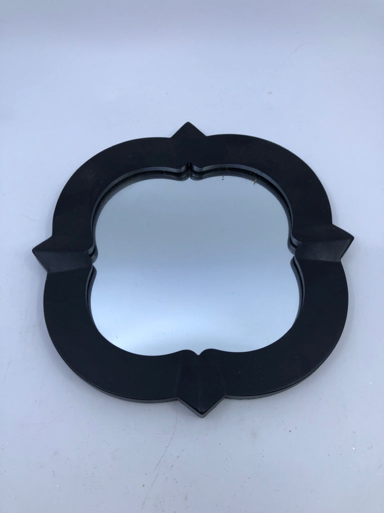 SMALL BLACK MIRROR.