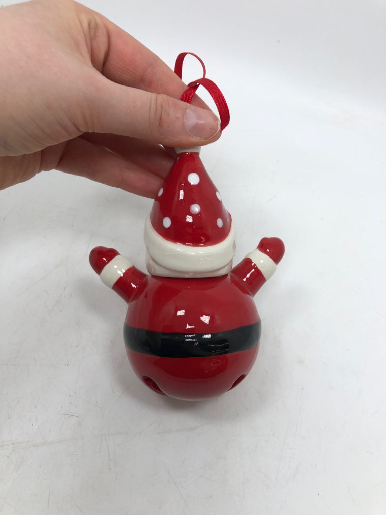 RED SANTA CERAMIC BELL ORNAMENT.