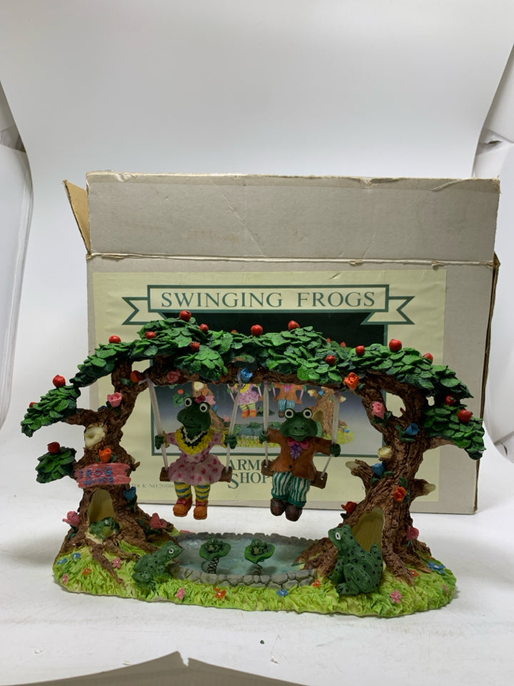 IN BOX 2 FROGS SWINGING FROM TREE RESIN.