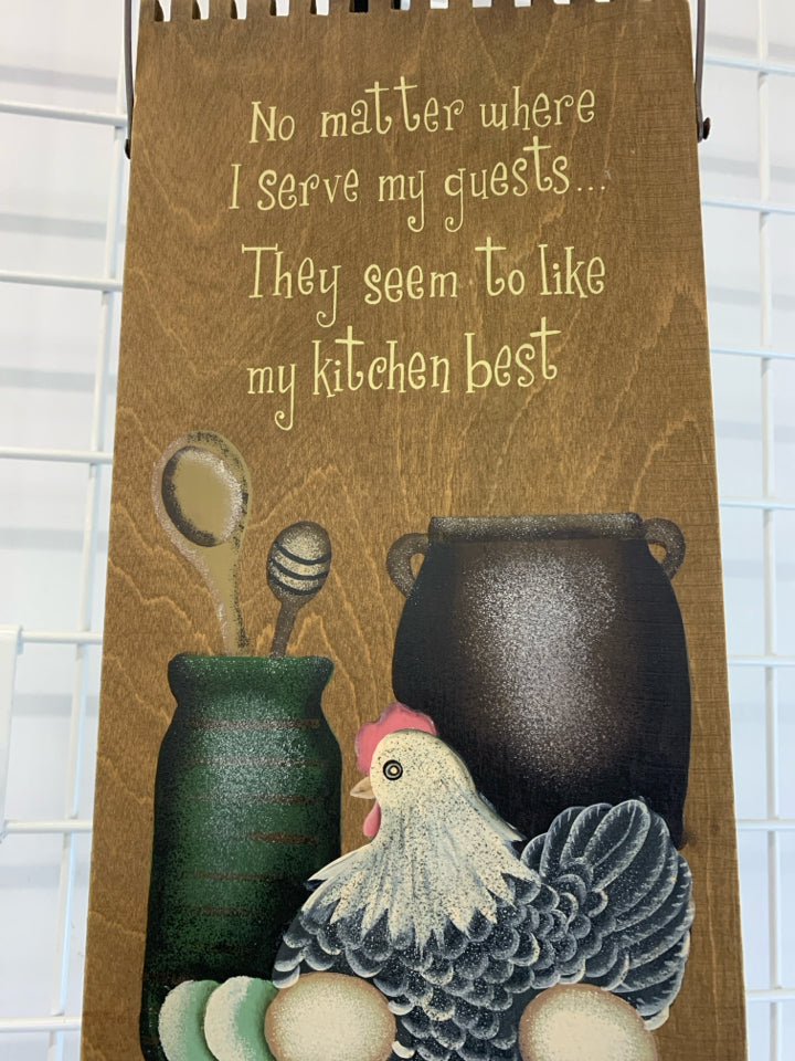 NO MATTER WHERE I SERVE MY GUESTS WOODEN KITCHEN WALL-HANGING.