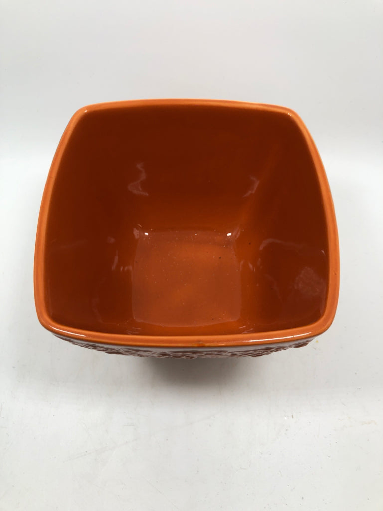 ORANGE PEDESTAL BOWL W/EMBOSSED ACORNS.