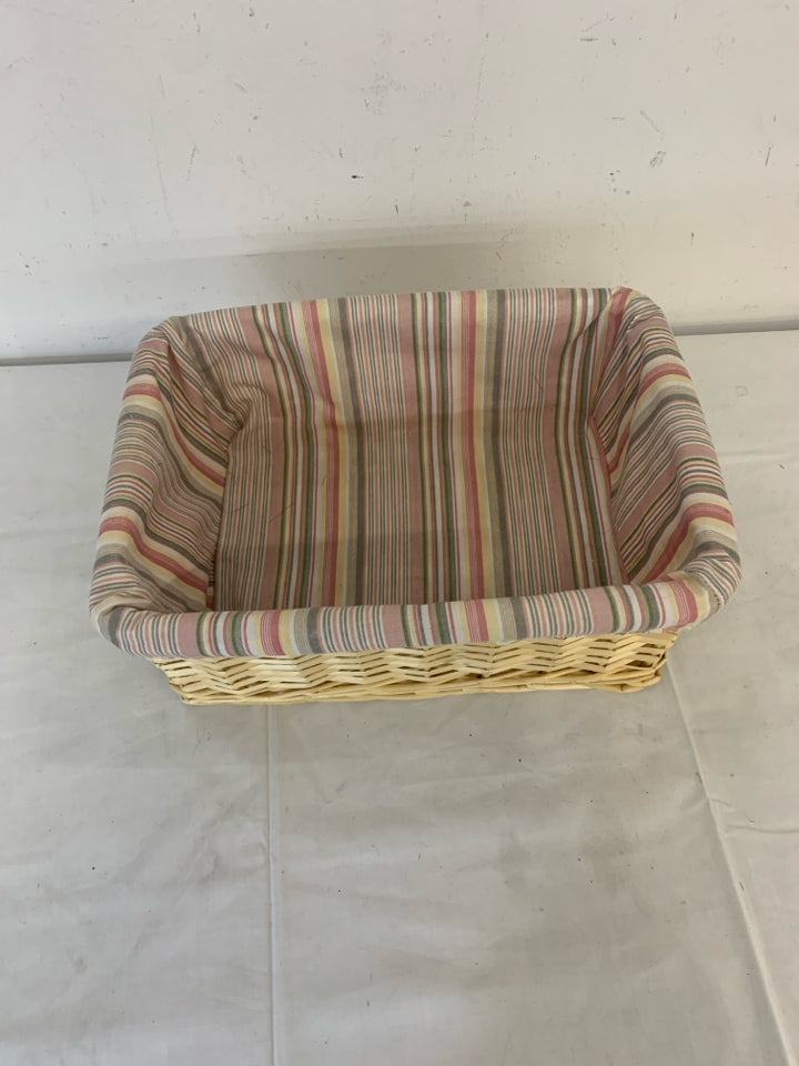 BLONDE WOVEN BASKET W PINK STRIPED LINER.