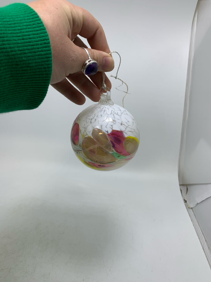 BLOWN GLASS COLORFUL ORNAMENT.