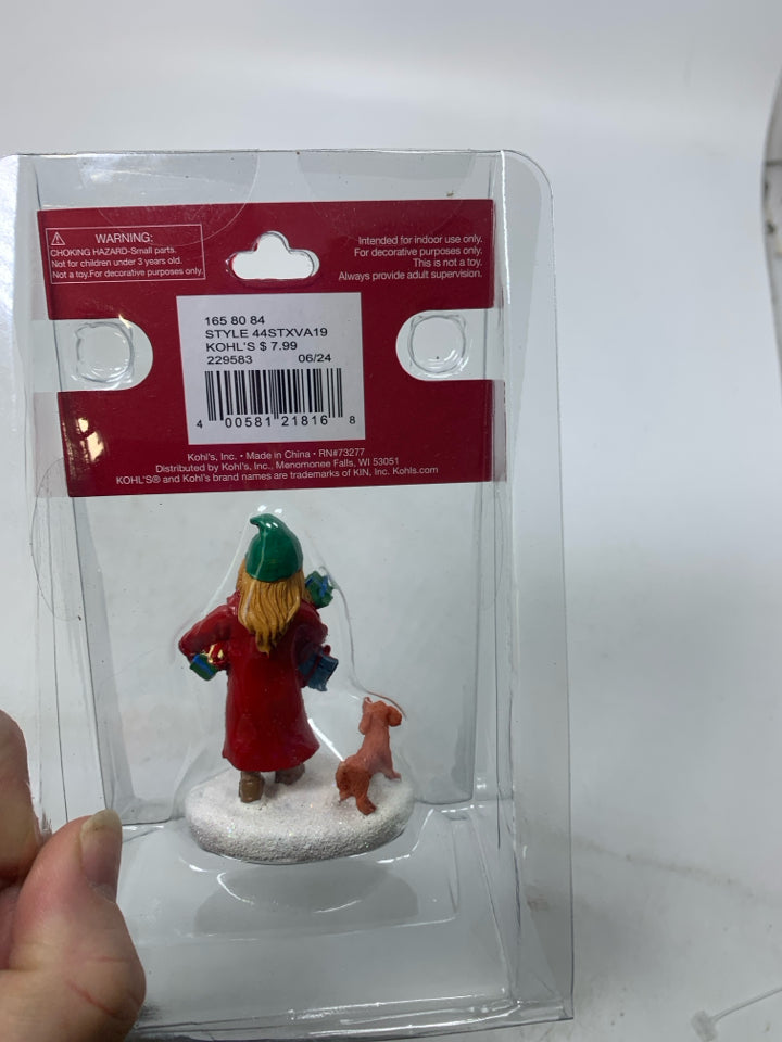 NIP GIRL HOLDING PRESENT W/ DOG VILLAGE CHARACTER.