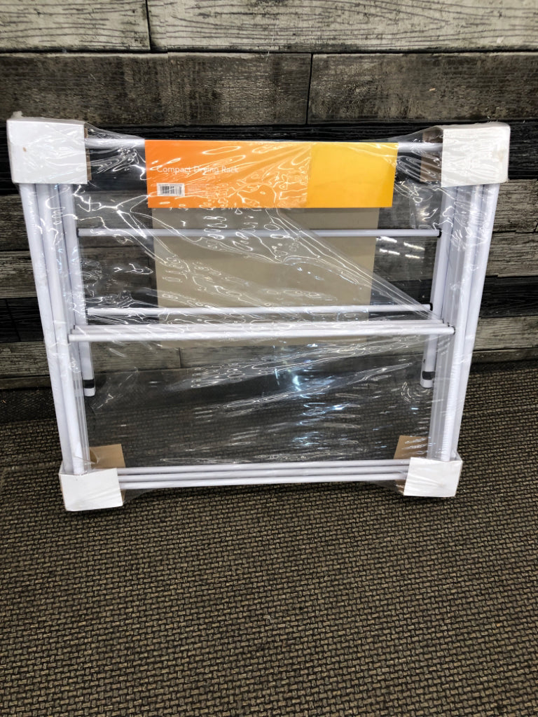 NIP WHITE METAL FOLDING DRYING RACK.