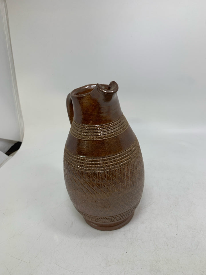 TEXTURED IRIDESCENT PITCHER W/ SHARP LIP.