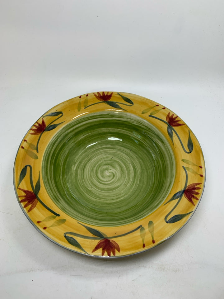 GREEN YELLOW W/ FLOWERS STONEWARE SERVING BOWL.