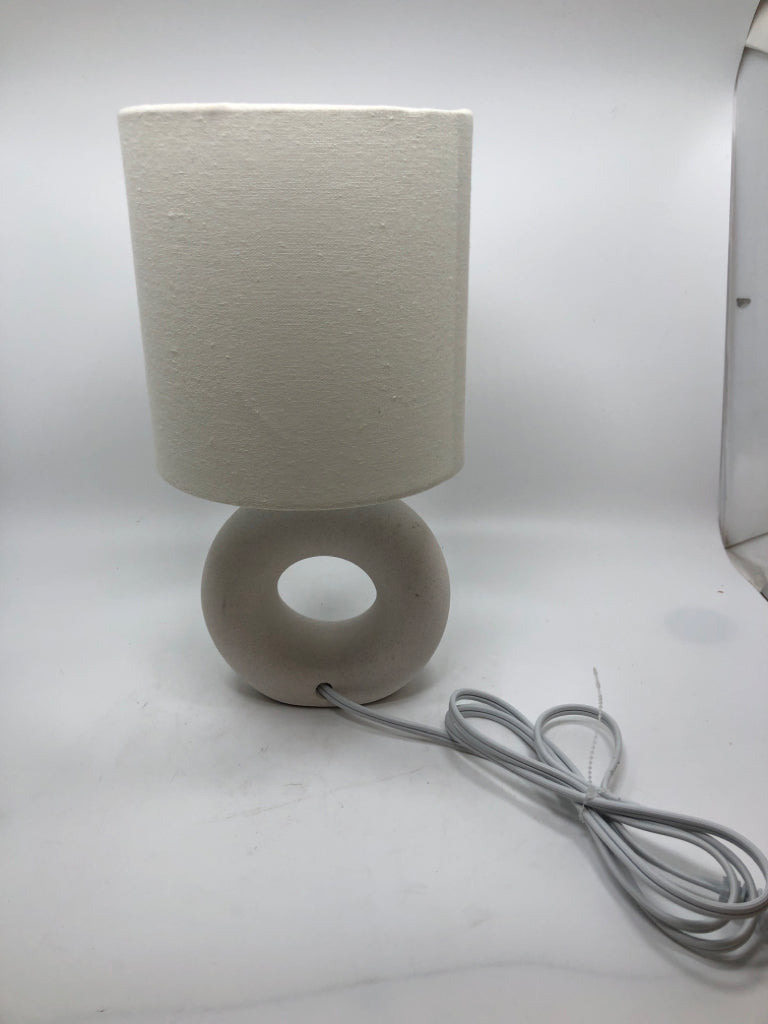 ABSTRACT SPECKLED CREAM LAMP.