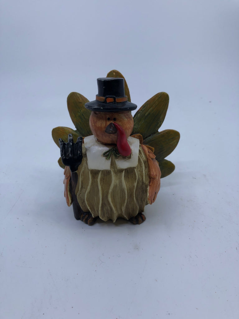 RESIN TURKEY W PITCH FORK.