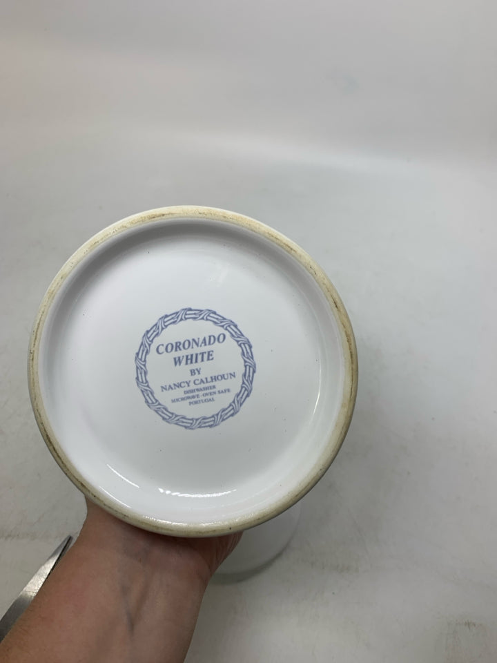 SHORT WHITE CANISTER MADE IN PORTUGAL.