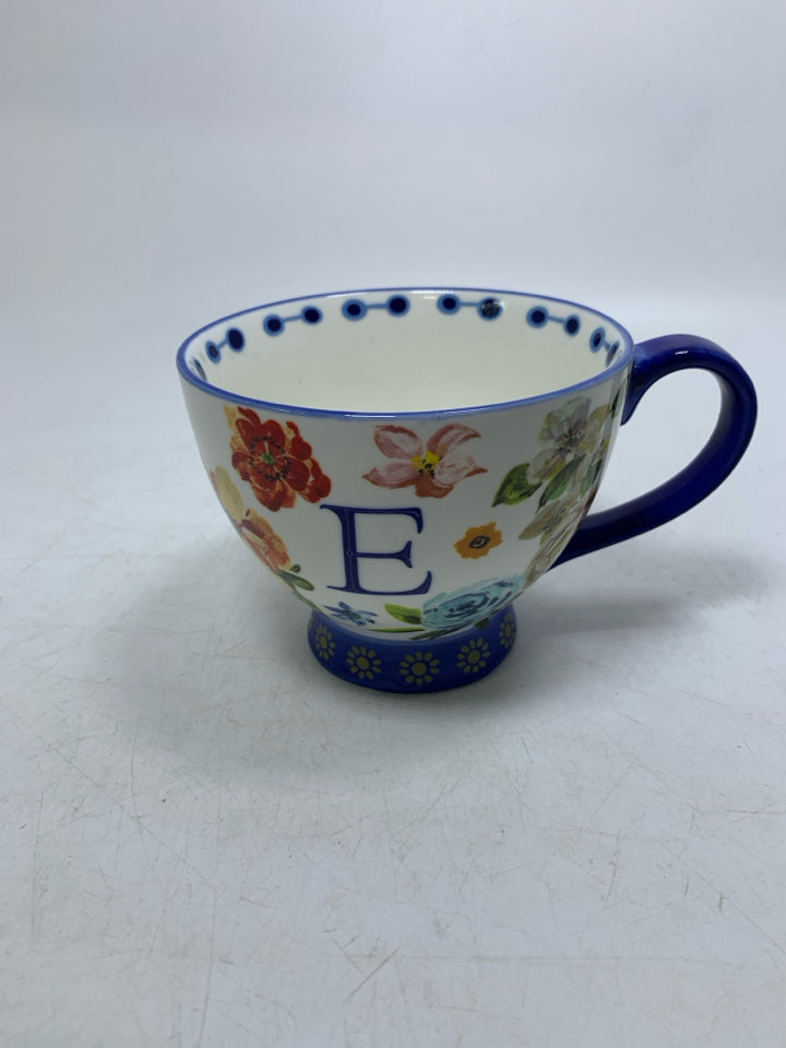FOOTED FLORAL MONOGRAM E MUG.
