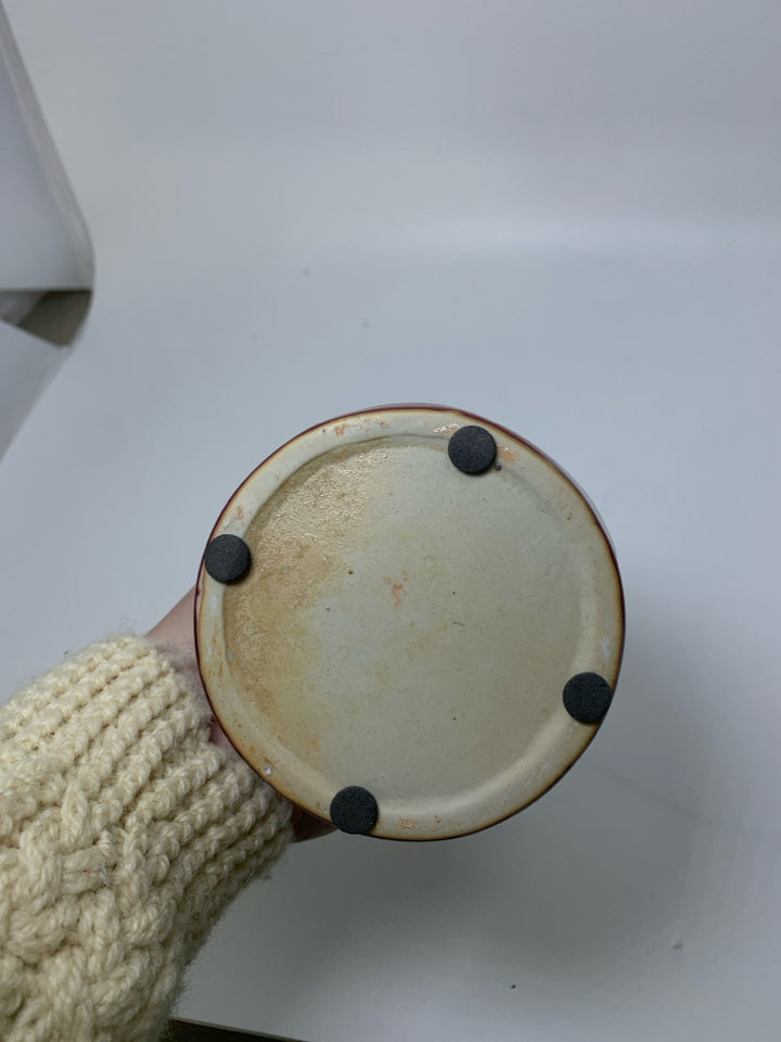 POTTERY DARK RED ANGEL W/ MARY/JOSEPH INSIDE TEA LIGHT HOLDER.